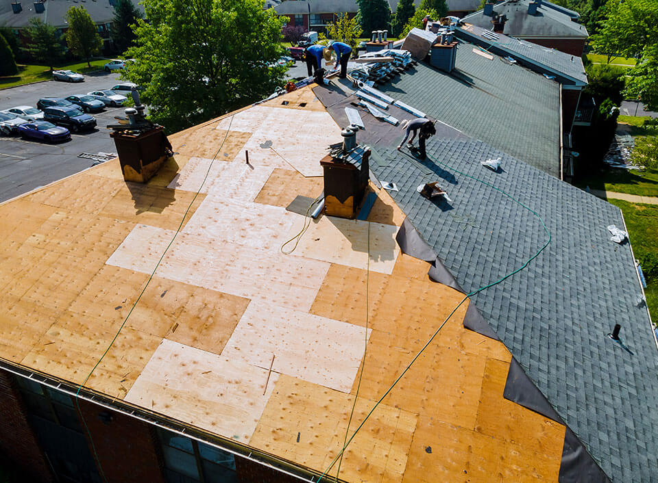 Apartment roof repair by Louisiana roofing company