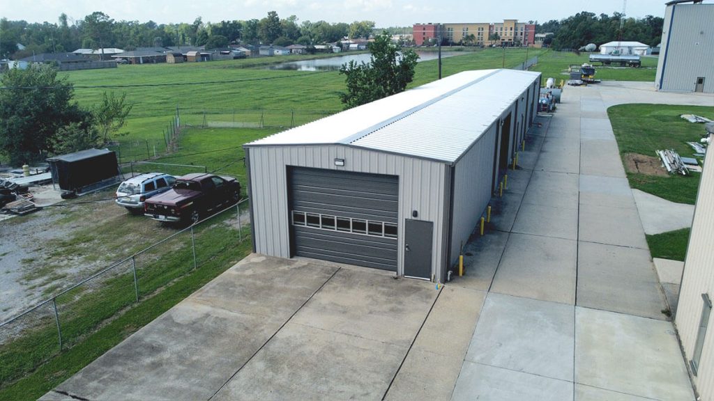 government construction exterior metal frame building with garage
